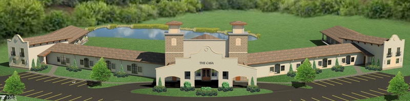 Architectural rendering of The Casa at Gervasi Vineyard, a Tuscan-style boutique hotel with twin towers, arched entryway, and a curved layout surrounding a pond, set against a wooded backdrop.